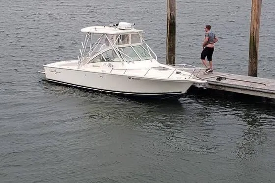 Slide: The Image of 2005 Albemarle 248 Express Fisherman boat anchor chain on deck. - 28