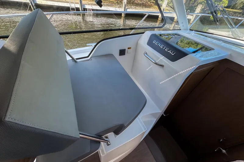 Slide: The Image of Interior view of 2025 Beneteau Antares 9 boat, featuring sleek seating and modern design. - 18