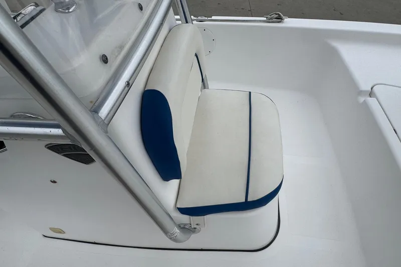 Slide: The Image of 2015 Tidewater 1800 Bay Max boat seat with blue and white upholstery. - 11
