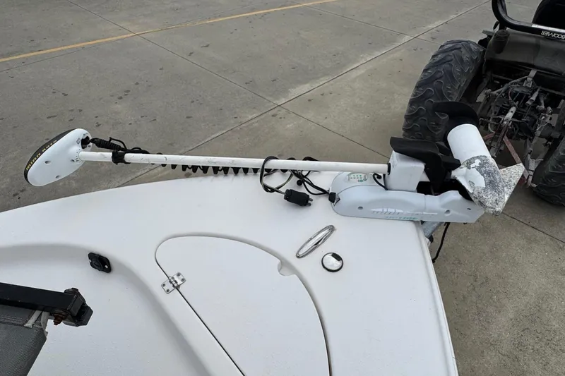 Slide: The Image of 2015 Tidewater 1800 Bay Max boat with mounted trolling motor on deck. - 15