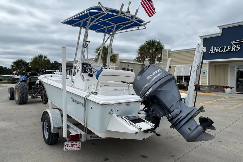 Slide: The Image of 2015 Tidewater 1800 Bay Max boat with Yamaha motor, parked outside Anglers store. - 3