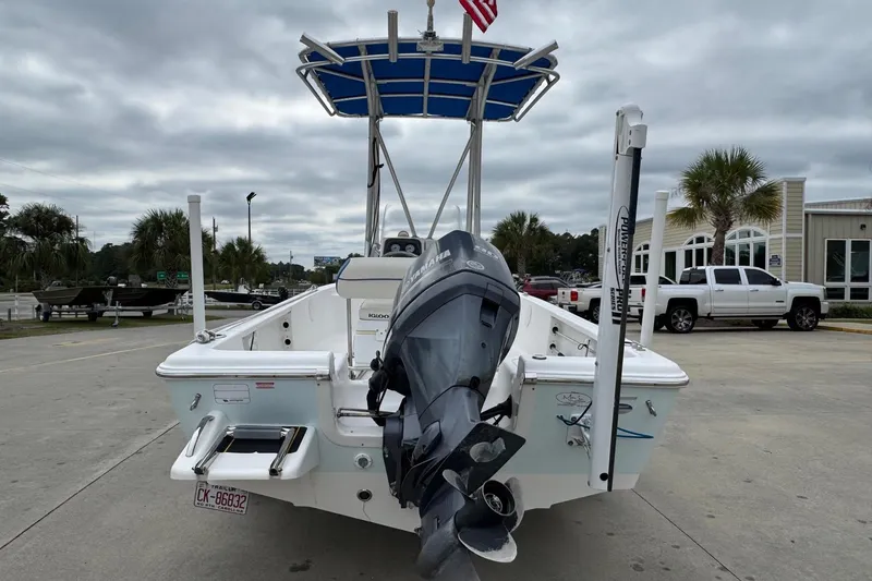 Slide: The Image of 2015 Tidewater 1800 Bay Max boat with Yamaha outboard motor, parked on concrete. - 4