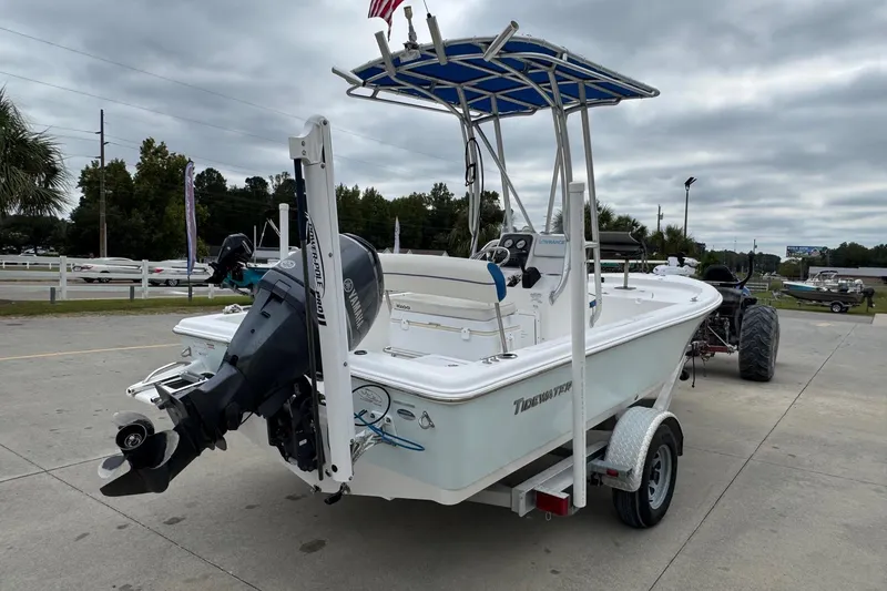 Slide: The Image of 2015 Tidewater 1800 Bay Max boat on trailer, featuring Yamaha outboard motor. - 5