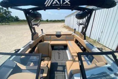 Slide: The Image of 2026 ATX Surf Boats 20 Type-S interior with tan seating and modern design. - 11