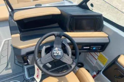 Slide: The Image of 2026 ATX Surf Boats 20 Type-S dashboard with modern steering and controls. - 7