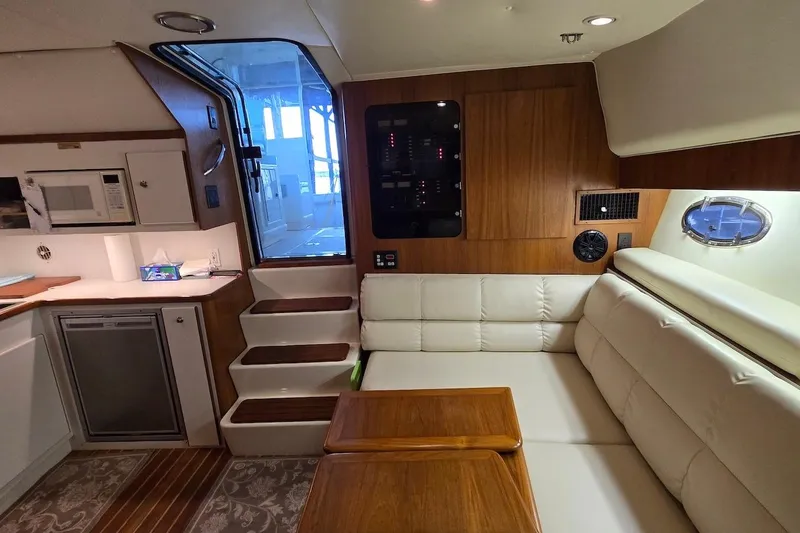 Slide: The Image of 1996 Tiara Yachts 3700 Open docked in a covered marina, Solomons, MD. - 34