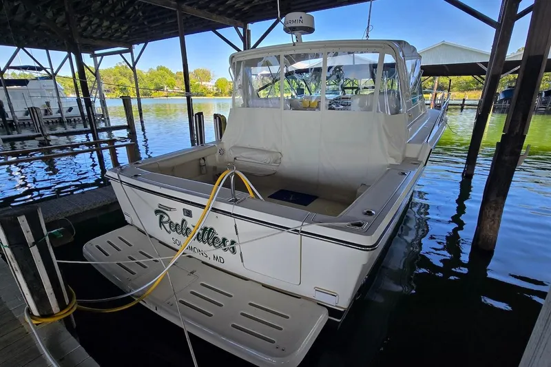 Slide: The Image of 1996 Tiara Yachts 3700 Open boat on calm water, Solomons, MD. - 4
