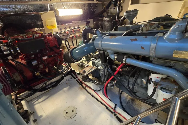 Slide: The Image of Engine room of a 1996 Tiara Yachts 3700 Open, showcasing mechanical components. - 51