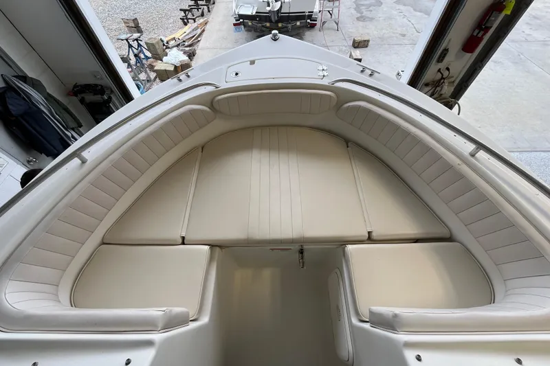 Slide: The Image of 2006 Hydra-Sports Lightning 202 DC boat interior with cushioned seating. - 11