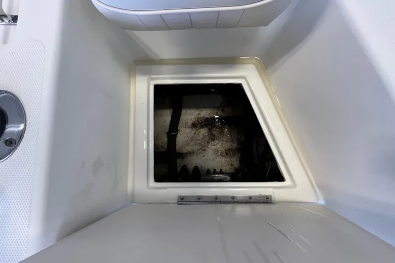Slide: The Image of 2006 Hydra-Sports Lightning 202 DC boat storage compartment, open and empty. - 21
