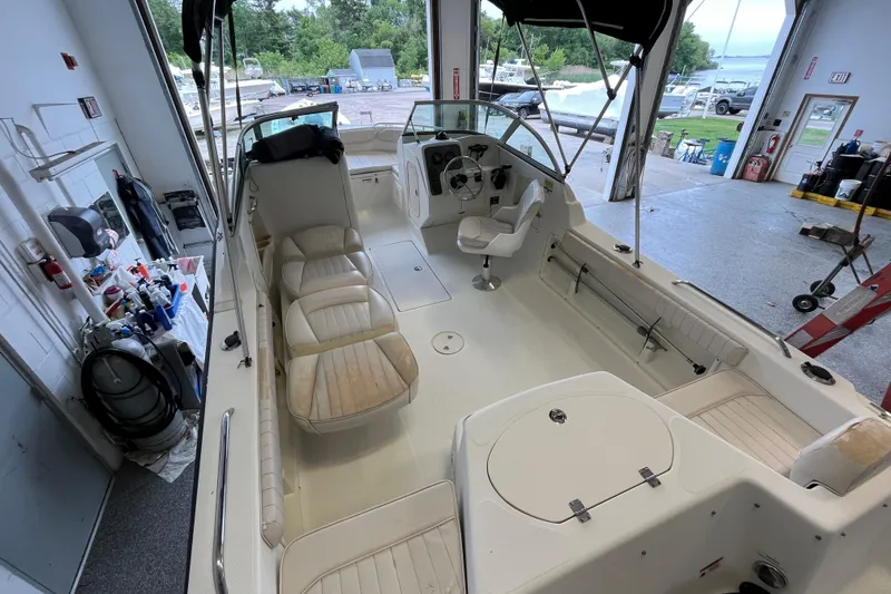 Slide: The Image of 2006 Hydra-Sports Lightning 202 DC boat interior in a garage setting. - 24