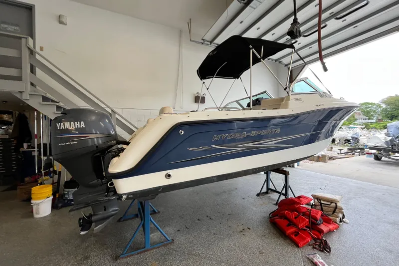 Slide: The Image of 2006 Hydra-Sports Lightning 202 DC boat with Yamaha engine in a garage setting. - 28