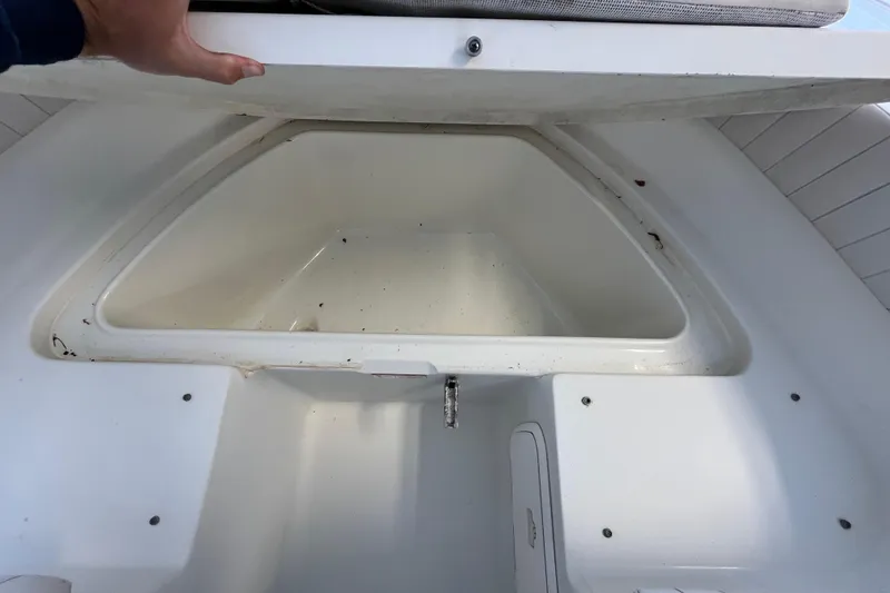 Slide: The Image of 2006 Hydra-Sports Lightning 202 DC boat storage compartment, open and empty. - 6