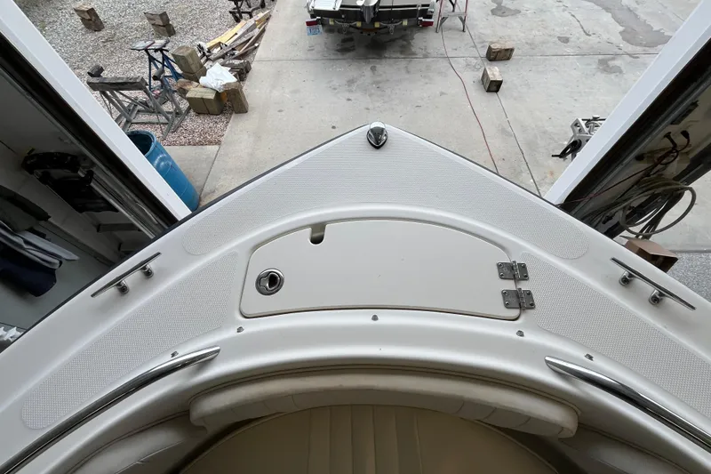 Slide: The Image of 2006 Hydra-Sports Lightning 202 DC boat bow in a garage setting. - 7