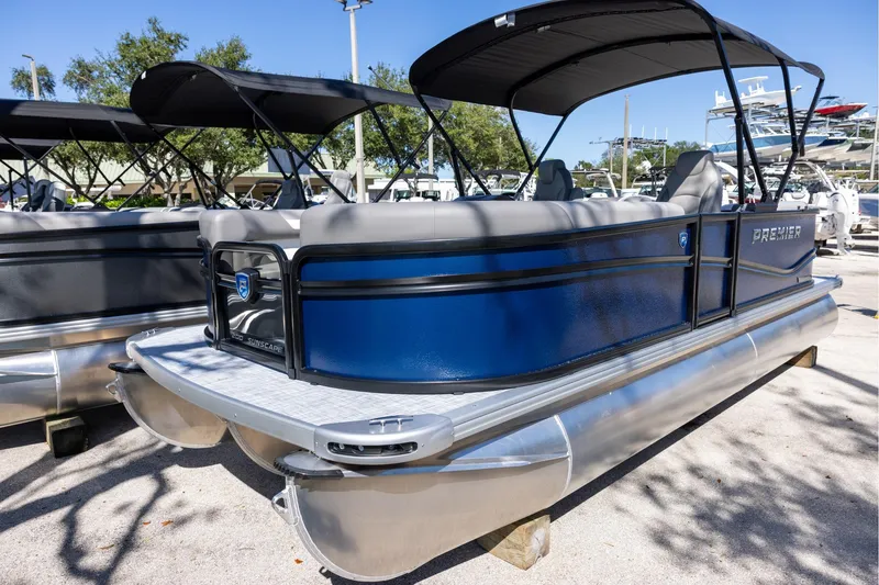 Slide: The Image of 2026 Premier 200 Sunscape RF pontoon boat with blue exterior and canopy. - 3
