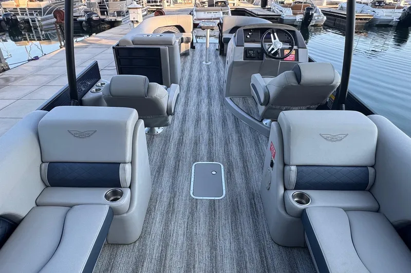 Slide: The Image of 2025 Bennington 26 L Top Deck boat interior with luxurious seating and modern design. - 6