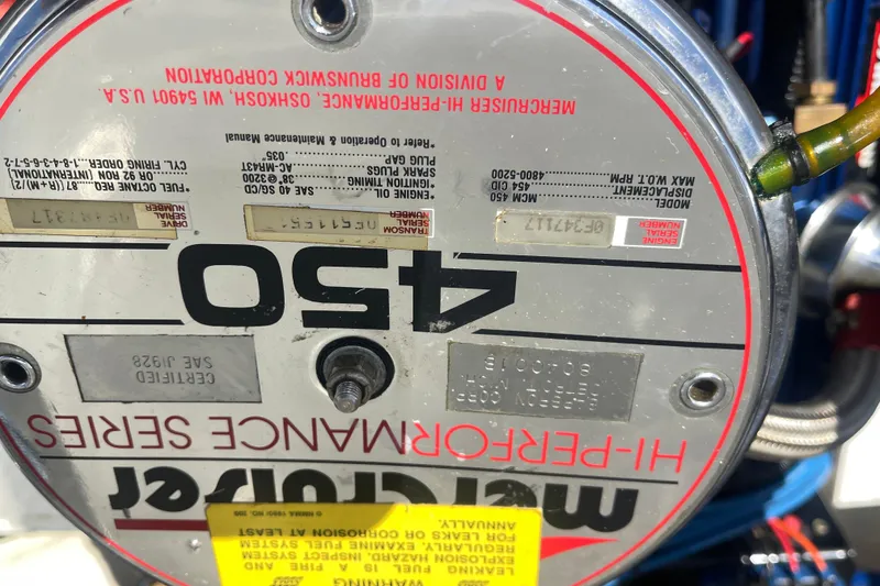 Slide: The Image of Engine label of a 1995 Excel Scarab 43, featuring MerCruiser Hi-Performance Series. - 35