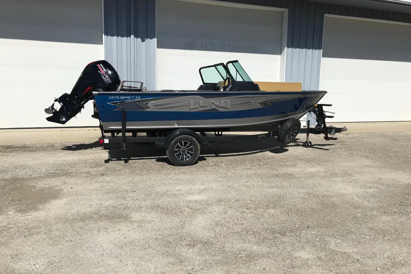 The Image of Man fishing with excitement, promoting 7-year factory-backed coverage for Mercury outboards. - 0