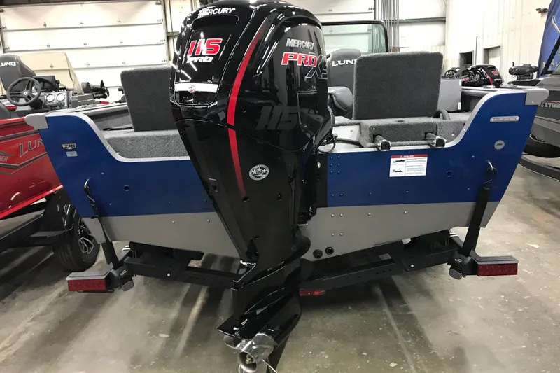 Slide: The Image of 2026 Lund 1875 Impact XS SS boat with Mercury 115 Pro XS outboard motor. - 6