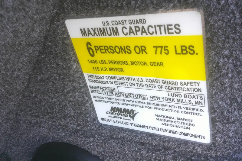 Slide: The Image of 2026 Lund 1775 Adventure Sport capacity label, 6 persons or 775 lbs, U.S. Coast Guard certified. - 10