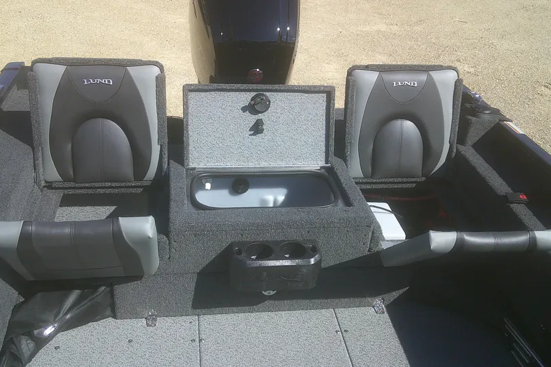 Slide: The Image of 2026 Lund 1775 Adventure Sport boat interior with seating and storage compartments. - 12