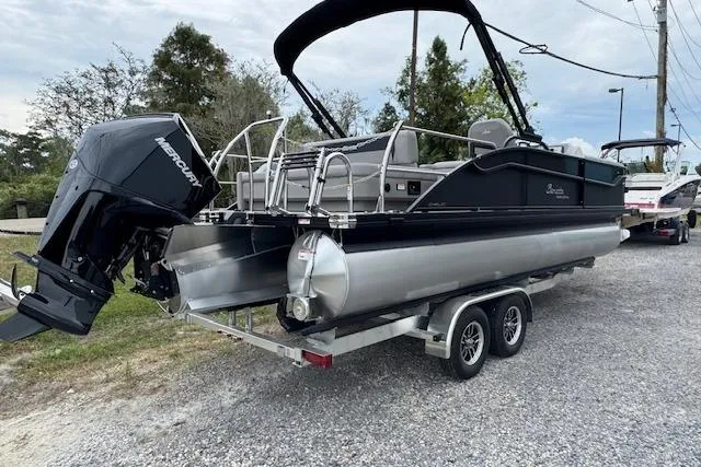 Slide: The Image of 2026 Barletta ARIA 24 UC pontoon boat on trailer, featuring Mercury outboard motor. - 3