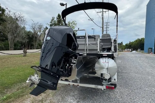 Slide: The Image of 2026 Barletta ARIA 24 UC pontoon boat with powerful outboard motor on trailer. - 4