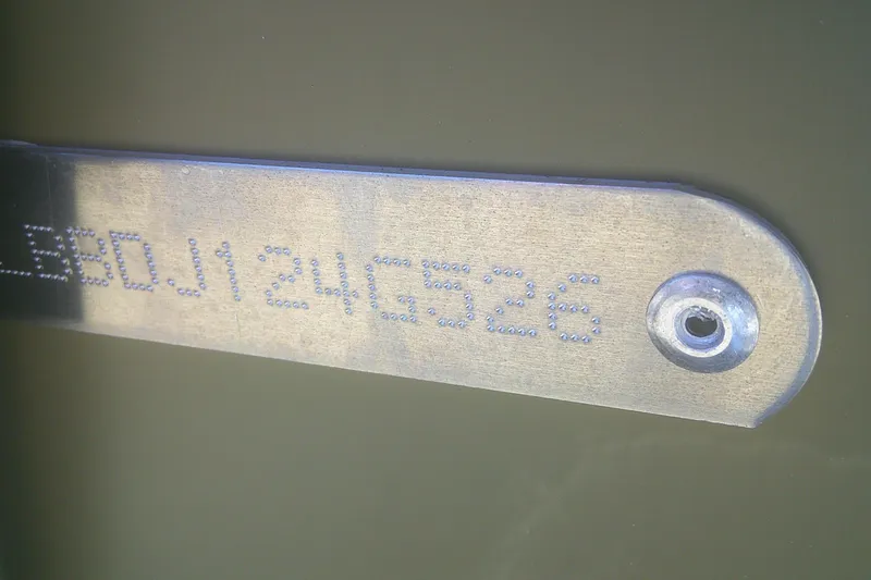 Slide: The Image of Metal plate with engraved serial number on 2026 Lund 1875 Alaskan Tiller boat. - 15
