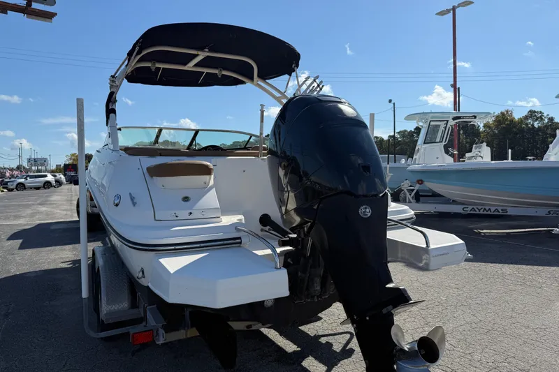 Slide: The Image of 2014 Sea Ray 240 Sundeck Outboard boat on trailer, rear view, sunny day. - 10