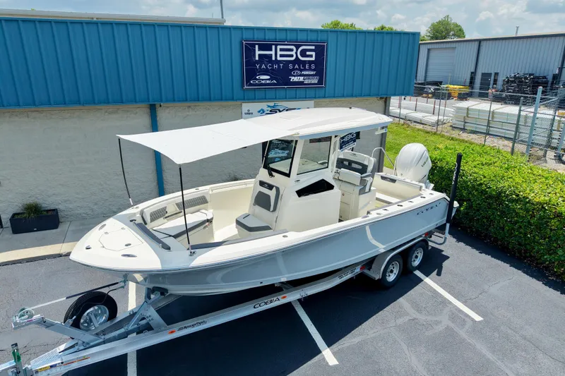 Slide: The Image of 2027 Cobia 245 Center Console boat on trailer at HBG Yacht Sales. - 4