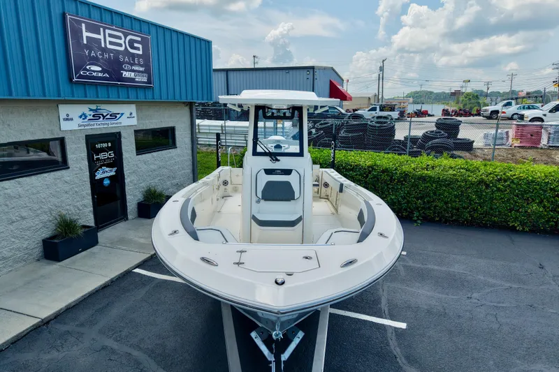 Slide: The Image of 2027 Cobia 245 Center Console boat displayed at HBG Yacht Sales. - 2