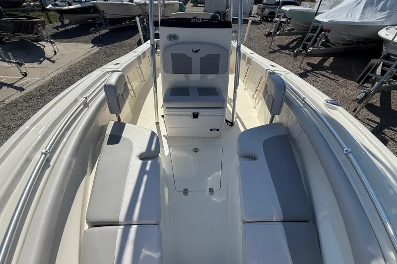 Slide: The Image of 2021 Mako 214 Center Console boat interior with seating and console view. - 15