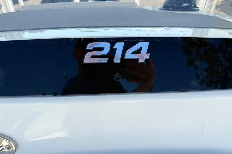 Slide: The Image of Close-up of 2021 Mako 214 Center Console boat model number. - 17