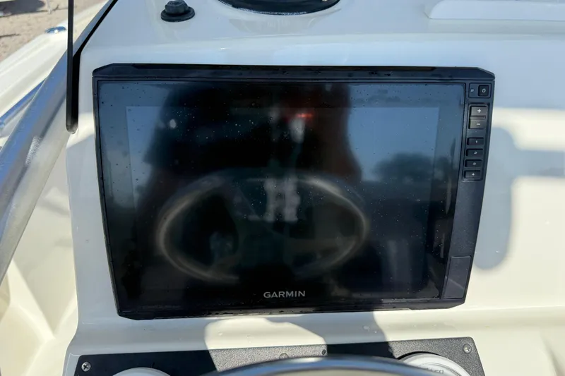Slide: The Image of Garmin display on 2021 Mako 214 Center Console boat dashboard. - 26