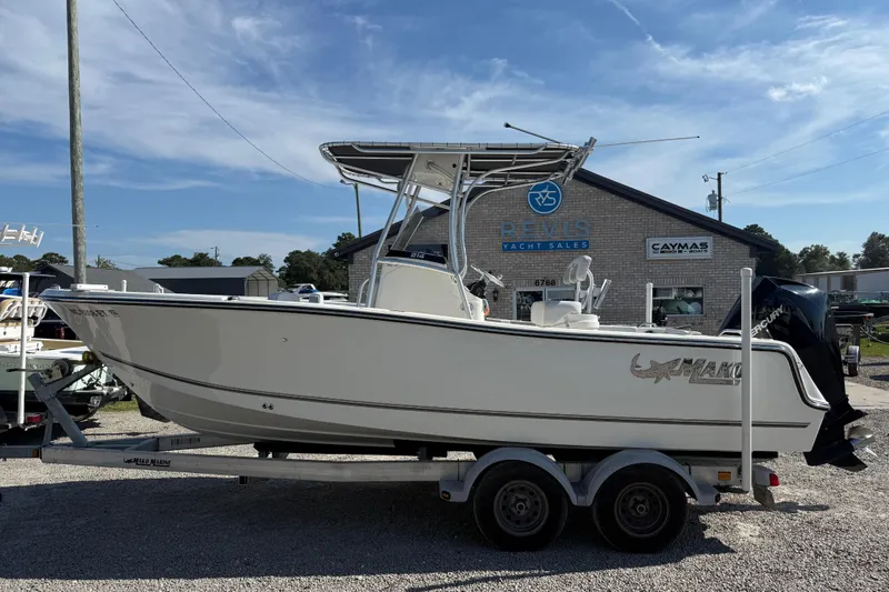 Slide: The Image of 2021 Mako 214 Center Console boat on trailer at yacht sales lot. - 4