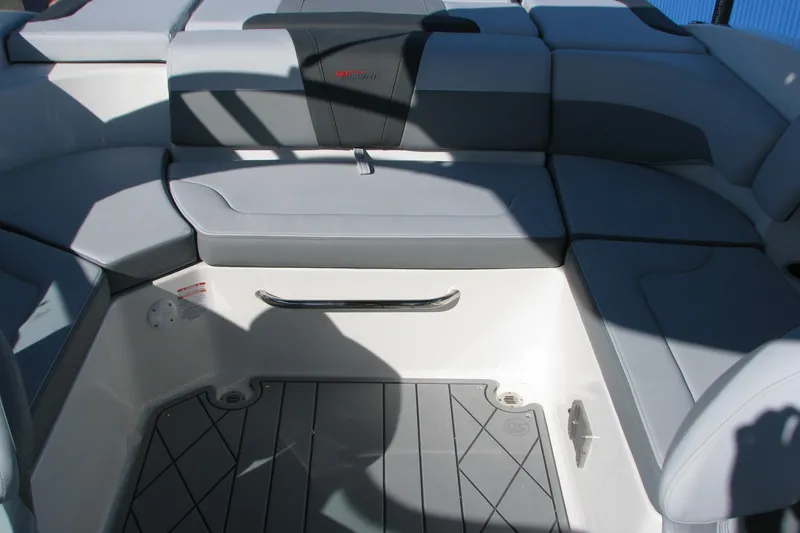 Slide: The Image of 2026 Chaparral 3 GTS boat interior with gray seating and modern design. - 10