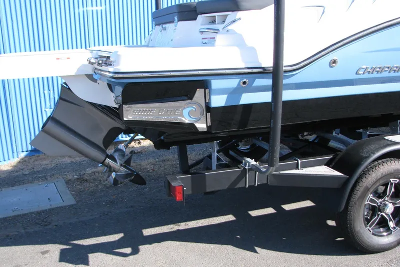 Slide: The Image of 2026 Chaparral 3 GTS boat rear view with propeller and trailer. - 2