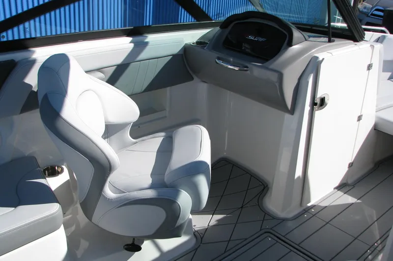 Slide: The Image of 2026 Chaparral 3 GTS boat interior with modern helm and comfortable seating. - 4
