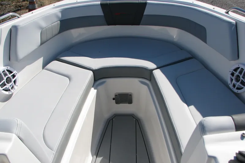 Slide: The Image of 2026 Chaparral 3 GTS boat interior with gray seating and speakers. - 5