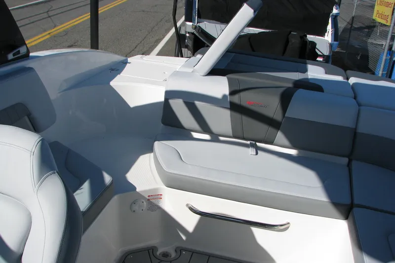Slide: The Image of 2026 Chaparral 3 GTS boat interior with gray seating and modern design. - 9