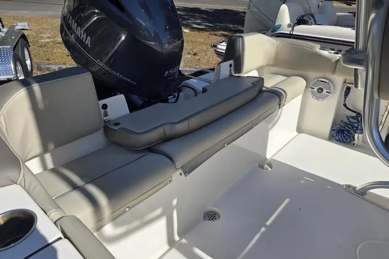 Slide: The Image of 2023 Key West 203 FS boat interior with Yamaha outboard motor. - 12