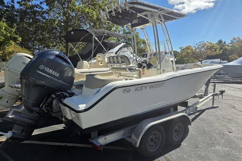 Slide: The Image of 2023 Key West 203 FS boat on trailer with Yamaha outboard motor. - 5