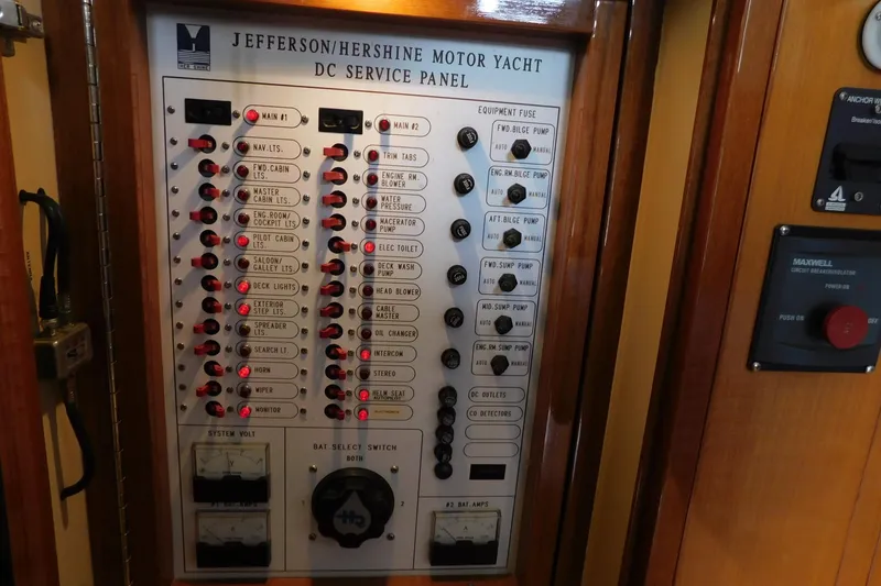 Slide: The Image of Luxurious interior of 2001 Jefferson Pilothouse 57 yacht with wood finishes and modern amenities. - 12