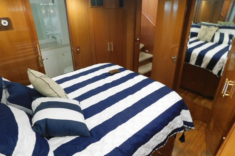 Slide: The Image of Pilothouse interior of 2001 Jefferson Pilothouse 57 yacht with navigation equipment and captain's chair. - 16
