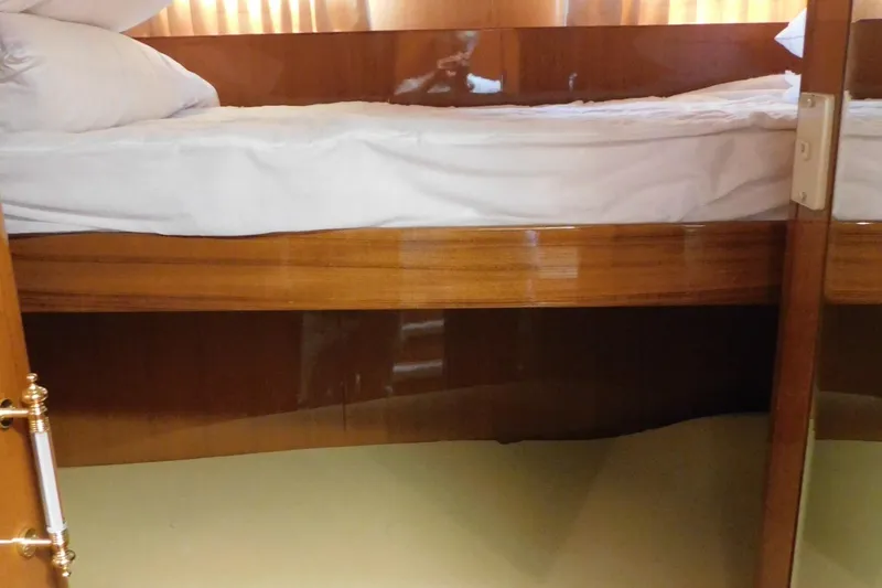 Slide: The Image of Luxurious cabin interior of 2001 Jefferson Pilothouse 57 yacht with nautical decor. - 25