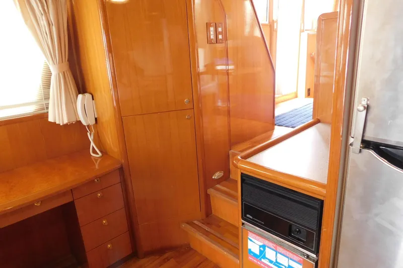 Slide: The Image of Side of Queen bed in Master Stateroom - 30