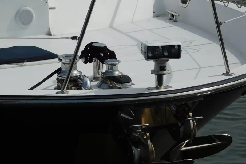 Slide: The Image of Bow of 2001 Jefferson Pilothouse 57 yacht with winches and navigation equipment. - 7