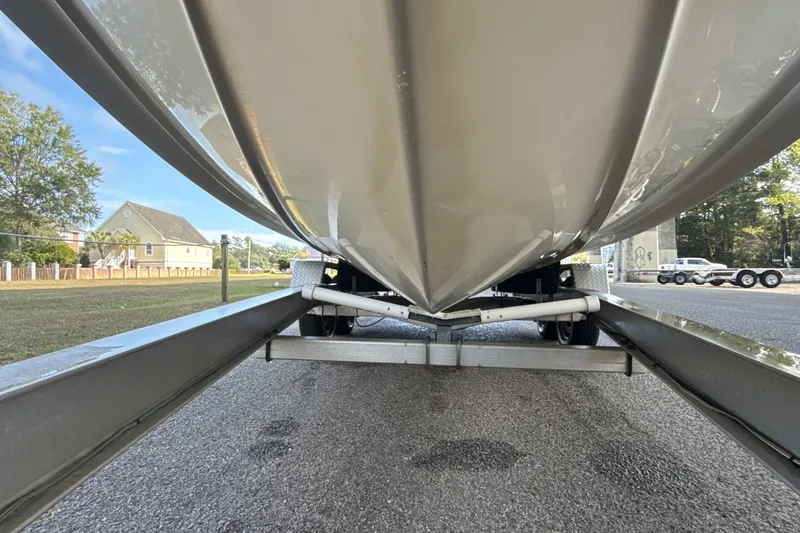 Slide: The Image of Underneath view of a 2000 Four Winns 260 Horizon boat on a trailer. - 17