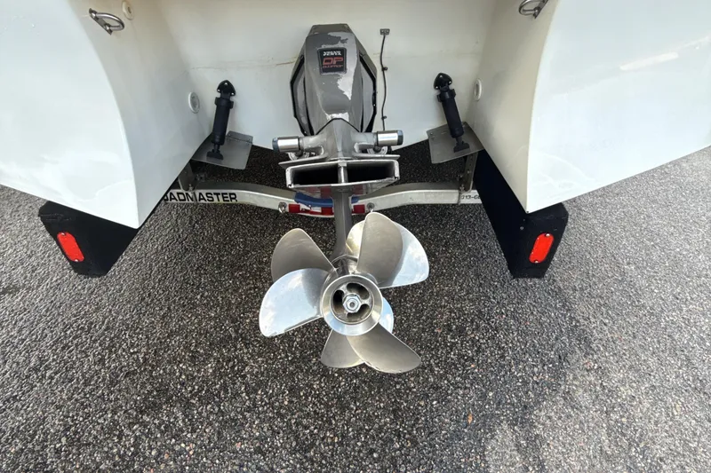 Slide: The Image of Rear view of 2000 Four Winns 260 Horizon boat with propeller and trailer. - 6