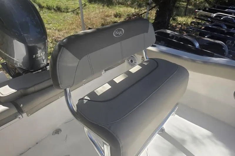 Slide: The Image of 2023 Key West 203 FS boat seat with gray upholstery and 150 HP engine. - 15